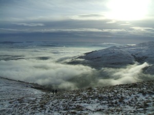 Looking down on clouds above Ben Lomond